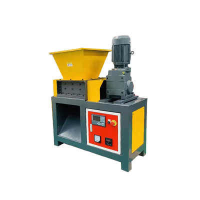 Machine de déchiquetage à double arbre multifonctionnelle pour plastique / métal