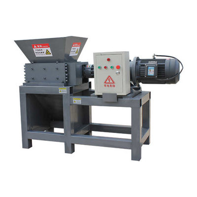 Machine à déchiqueter les déchets métalliques et textiles